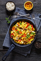 Chicken Paella with mushrooms, red pepper, spices