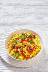 Chicken Paella with mushrooms, red pepper, spices