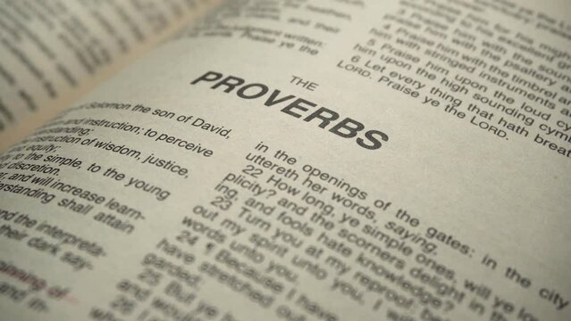 Close up page reading of the holy bible page on Proverbs Chapter 
