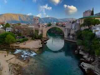 Fotobehang Stari Most The old bridge and river in city of Mostar