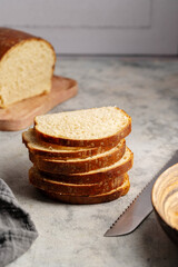 Closeup bread stack of bread slices. Sandwich sourdough loaf bread cut in slices.