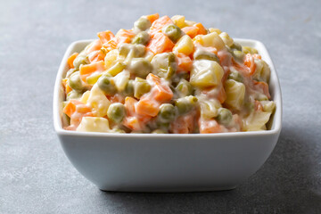 Russian salad Olivier with mayonnaise and egg served (Turkish name; Rus salatasi) - obrazy, fototapety, plakaty