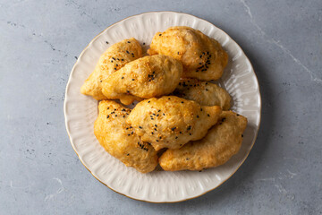 Turkish cuisine; Handmade Cheese spinach Pastry (Turkish name; peynirli - ispanakli pogaca, pişi)