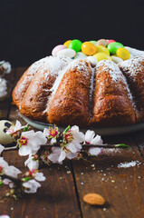 Easter Cake, Traditional Cake Decorated with Sugar Eggs on Wooden Rustic Background
