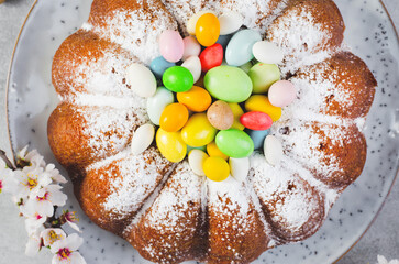 Easter Cake, Traditional Cake Decorated with Sugar Eggs on Bright Background