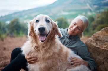 Elderly woman, hiking with dog in forest and adventure, fitness with travel and pet with love and...