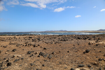 Volcanic beach with blue sky 