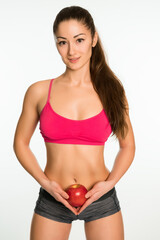 Sporty woman with an apple