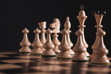 Chess figures on a black background