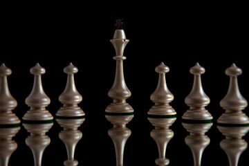 Chess figures on a black background