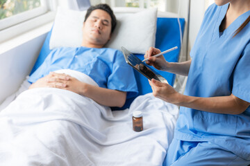 Obraz premium Nurse and male patient in hospital.