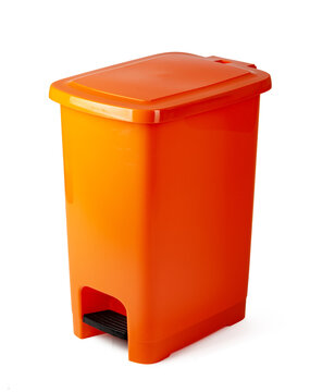 Orange plastic waste bin isolated on white