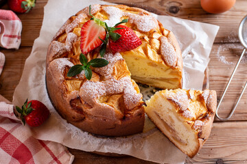 Fresh sponge cake on a wooden cutting board. Chiffon biscuit