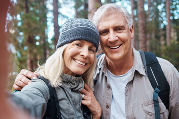 Old couple, selfie and hiking in forest, happy people in portrait, nature and memory for social...