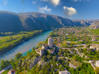 Fototapeta na wymiar The Tower of the Kula Fort in the Historic Village of Pocitelj in Bosnia and Herzegovina, with the River Neretva