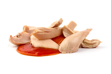 Chicken fillet with sauce, isolated on white background.