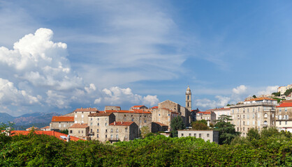 Fototapeta na wymiar Sartene town on a summer day. Panoramic landscape photo of Corsica