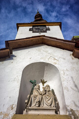 Tower of church in village Spania Dolina, Slovakia - obrazy, fototapety, plakaty