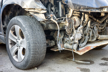 Obraz premium Front of blue car get damaged by accident on the road