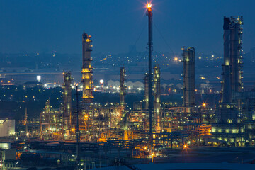 Fototapeta na wymiar Morning scene of oil refinery plant and power plant of Petrochemistry in the morning time on the top of the hill