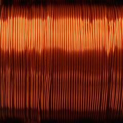 Copper wire, enamelled, on a coil, close up. Double coated and insulated copper winding wire on a...