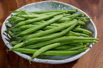 Raw fresh organic green beans ready to cook