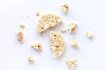 Broken puffed rice cracker isolated on white background