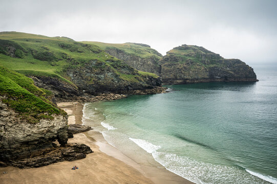 A view of lush cliffs along the coastline of Cornwall