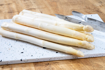 Spring season, new harvest of Dutch, German white asparagus, bunch of raw white asparagus