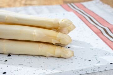 Spring season, new harvest of Dutch, German white asparagus, bunch of raw white asparagus
