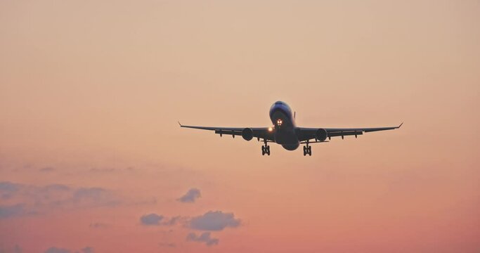 Sunrise of dratamtic sky with airplane at dawn