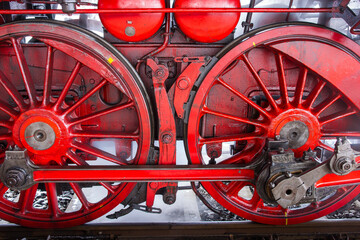 Red wheels of steam locomotive