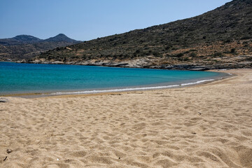 Panoramic view of the wonderful turquoise sandy beach of Plakes in Ios Greece
