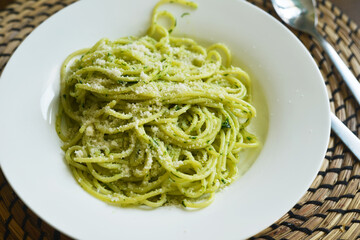 Wild garlic pesto with parmesan cheese on a plate