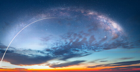 Long Exposure Night Time Rocket Launch - Planet Earth with a spectacular sunset Milky Way galaxy in...