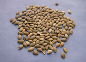 pumpkin seeds on a white background. macro. close-up