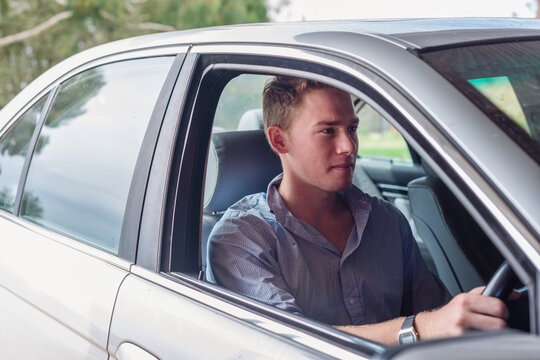 young man in a car