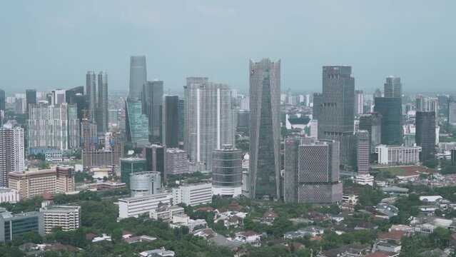 residential buildings, jakarta indonesia, district, city life, central, emerging economies, building exterior, sudirman, road, financial district, tall, highway, landmark, day, development, metropolit