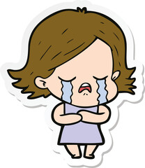 sticker of a cartoon girl crying