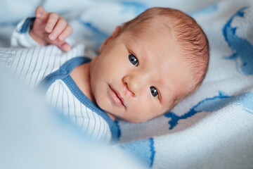 Portrait of a smiling newborn