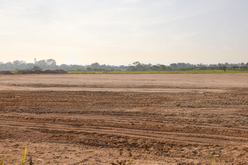 Land, landscape at evening. Include soil backfill, empty or vacant area at outdoor. Real estate or...