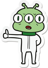 sticker of a cartoon three eyed alien