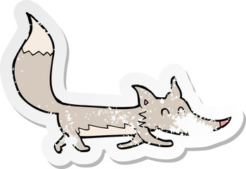 retro distressed sticker of a cartoon little wolf