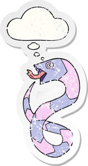 cartoon snake and thought bubble as a distressed worn sticker