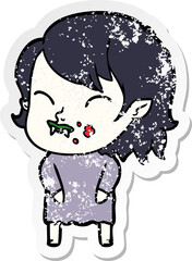 distressed sticker of a cartoon vampire girl with blood on cheek