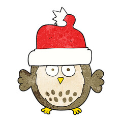 textured cartoon owl wearing christmas hat