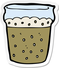 sticker of a cartoon glass of beer