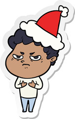 sticker cartoon of a angry man wearing santa hat