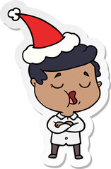 sticker cartoon of a man talking wearing santa hat