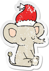 distressed sticker of a cute christmas elephant